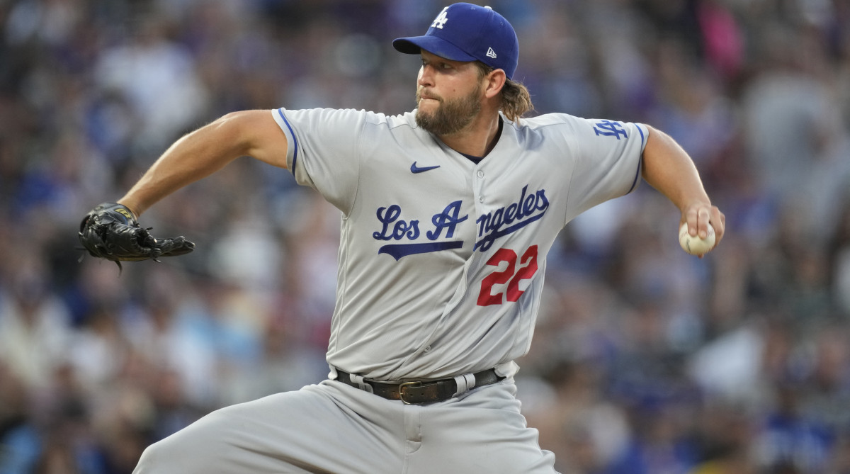 Dodgers starting pitcher Clayton Kershaw works against the Colorado Rockies.