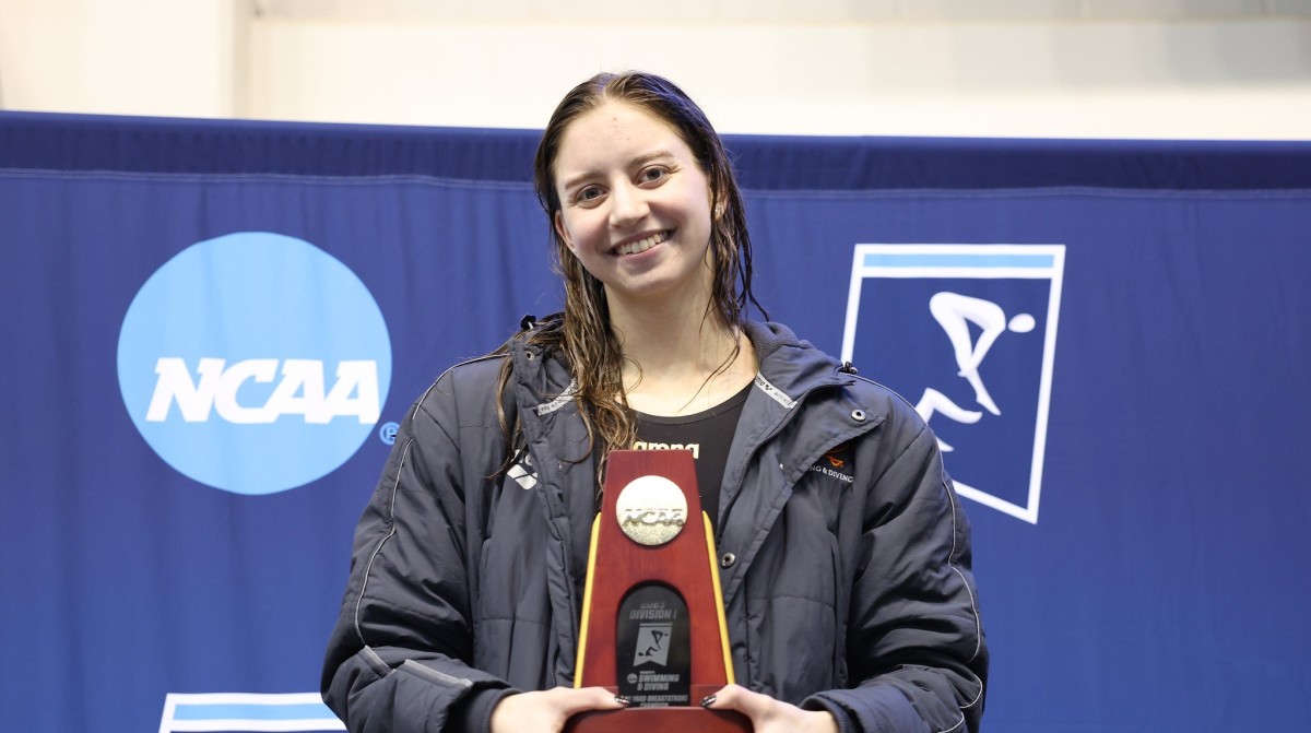 Kate Douglass poses with her trophy after winning her seventh-career NCAA individual title at the 2023 NCAA Swimming & Diving National Championships in Knoxville, Tennessee.