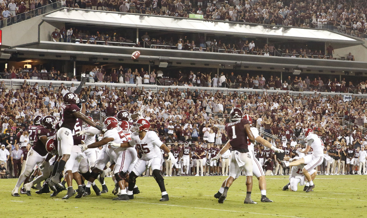Alabama kicker Will Reichard (16) hits a field goal against Texas A&M at Kyle Field. Texas A&M defeated Alabama 41-38 on a field goal as time expired.