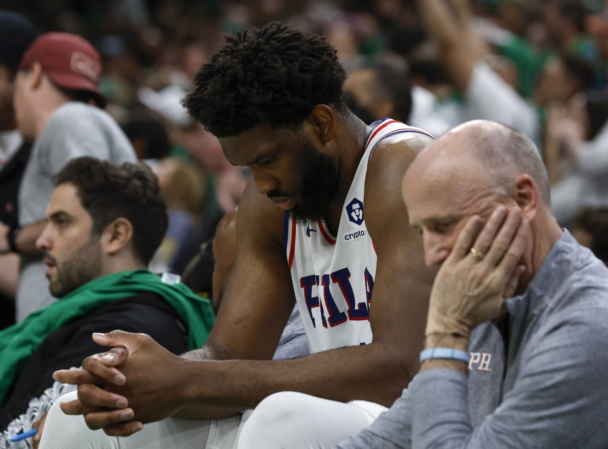 Philadelphia 76ers center Joel Embiid sits