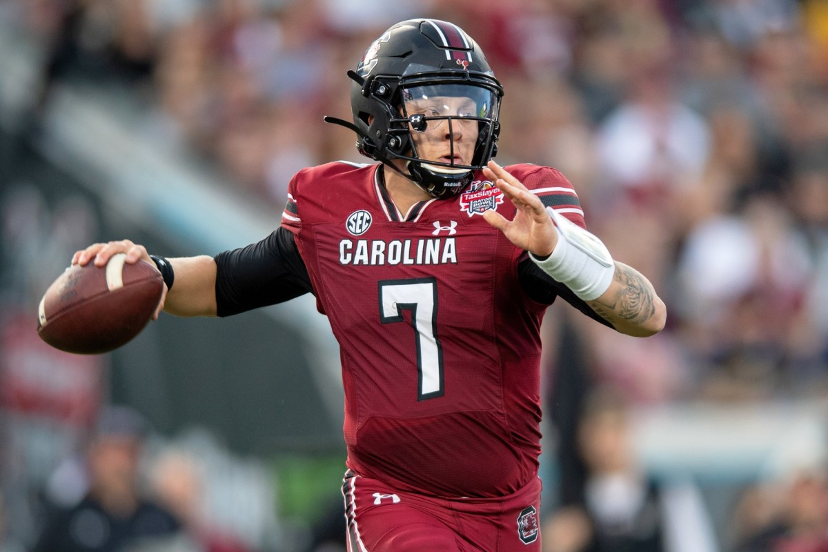 South Carolina Gamecocks quarterback Spencer Rattler (7) throws the ball against the Notre Dame Fighting Irish in the second quarter in the 2022 Gator Bowl at TIAA Bank Field.