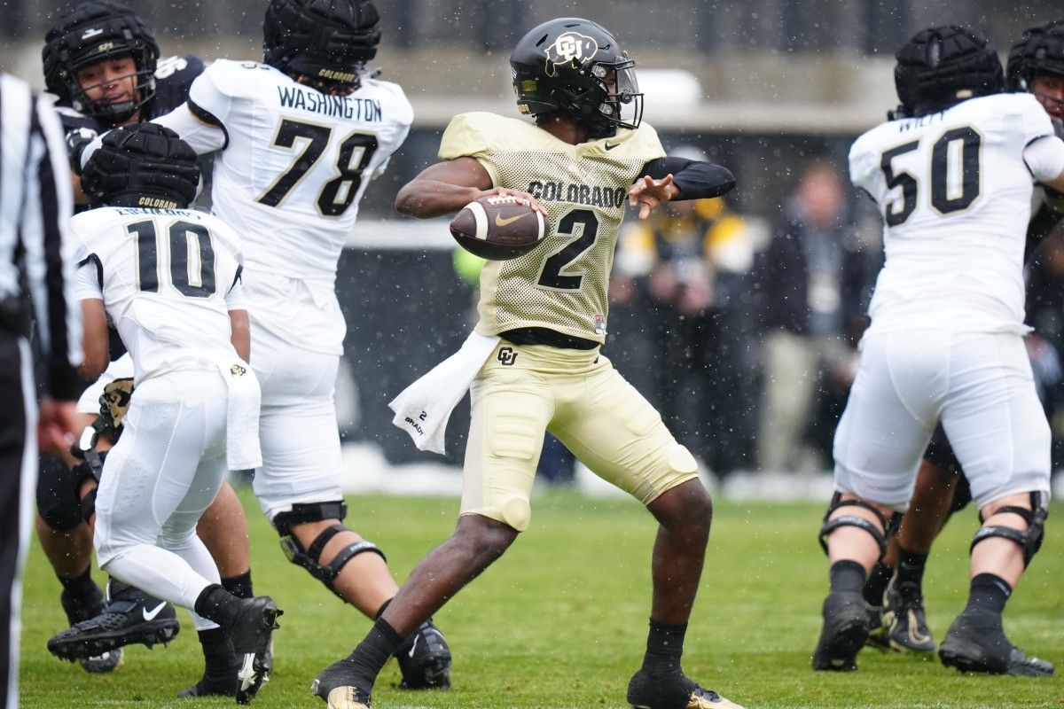 Colorado Buffaloes quarterback Shedeur Sanders (12) prepares to pass during the first half of the spring game at Folsom Filed.