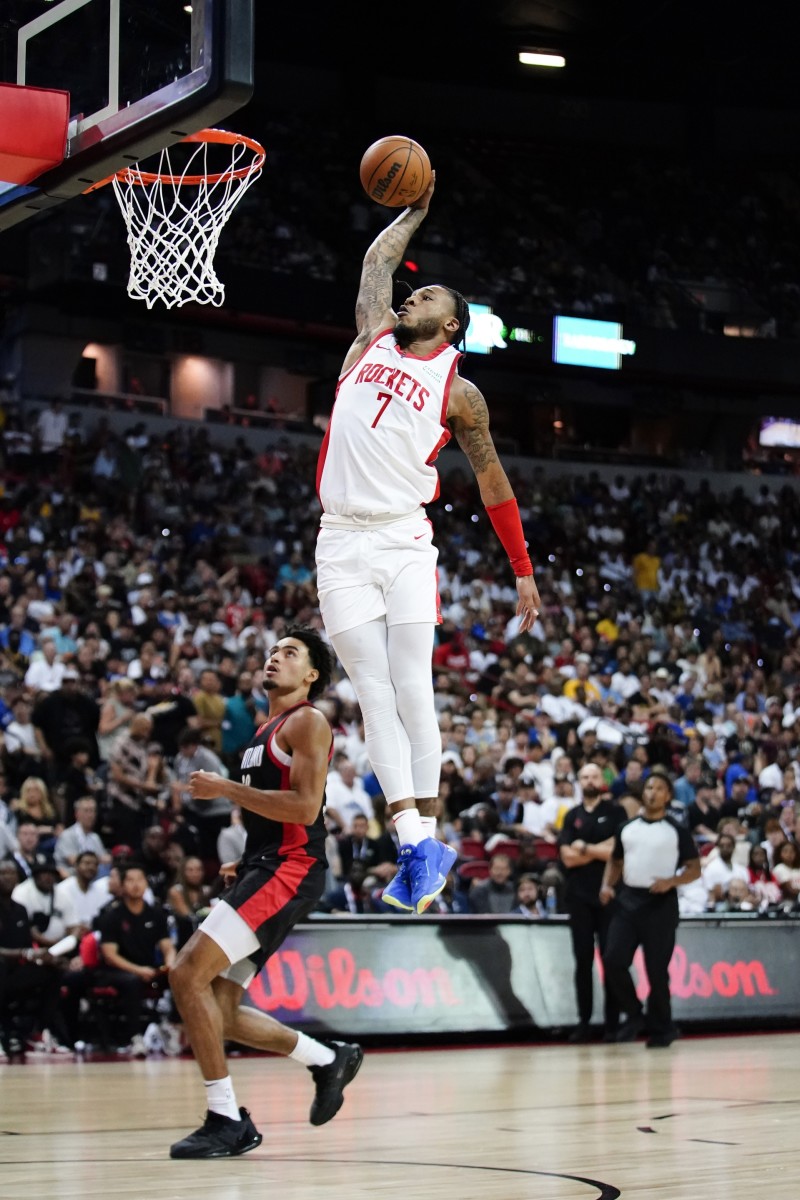 Houston Rockets forward Cam Whitmore (7) dunks the ball against Portland Trail Blazers forward Justin Minaya (60) during the second half at Thomas & Mack Center.