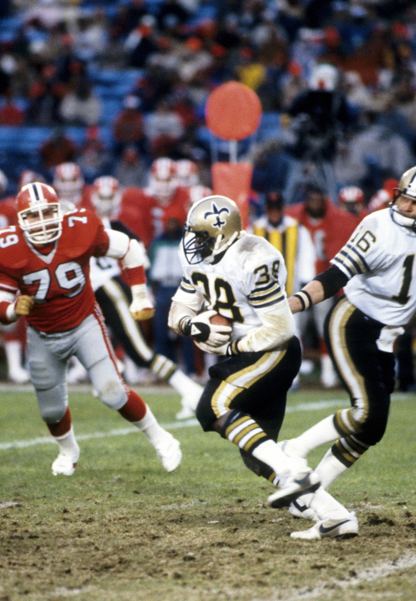 Dec 12, 1982; FILE PHOTO; New Orleans Saints running back George Rogers (38) runs the ball against the Atlanta Falcons. Mandatory Credit: Manny Rubio-USA TODAY