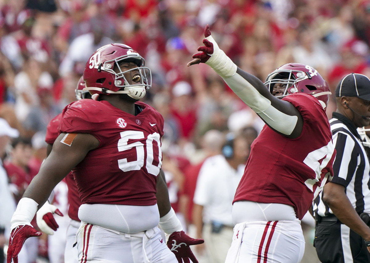 Sep 11, 2021; Tuscaloosa, Alabama, USA; Alabama Crimson Tide defensive lineman Byron Young (47) celebrates with Alabama Crimson Tide defensive lineman Tim Smith (50) after Young sacked Mercer Bears quarterback Carter Peevy (15) (not shown) at Bryant-Denny Stadium. Mandatory Credit: Marvin Gentry-USA TODAY Sports