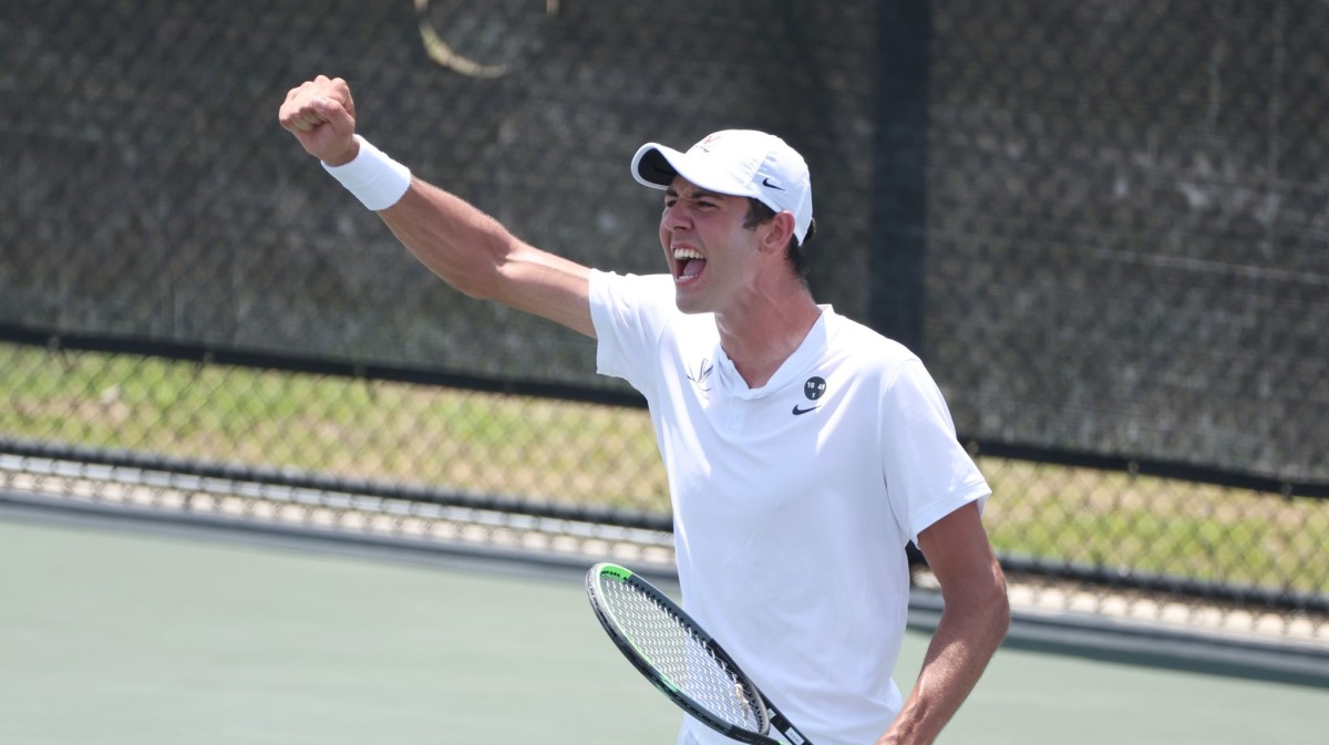 Chris Rodesch celebrates after scoring a point during the Virginia men's tennis match against Ohio State in the NCAA Men's Tennis National Championship match in Orlando, Florida.