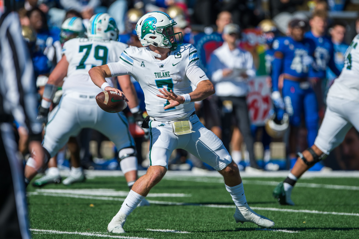 quarterback Michael Pratt slings his arm back to throw the ball