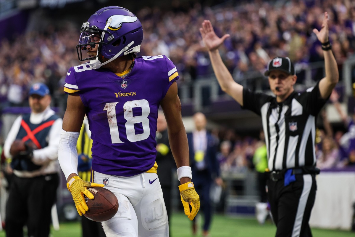 Minnesota, USA; Minnesota Vikings wide receiver Justin Jefferson (18) makes a catch for a touchdown against the Indianapolis Colts during the fourth quarter at U.S. Bank Stadium.