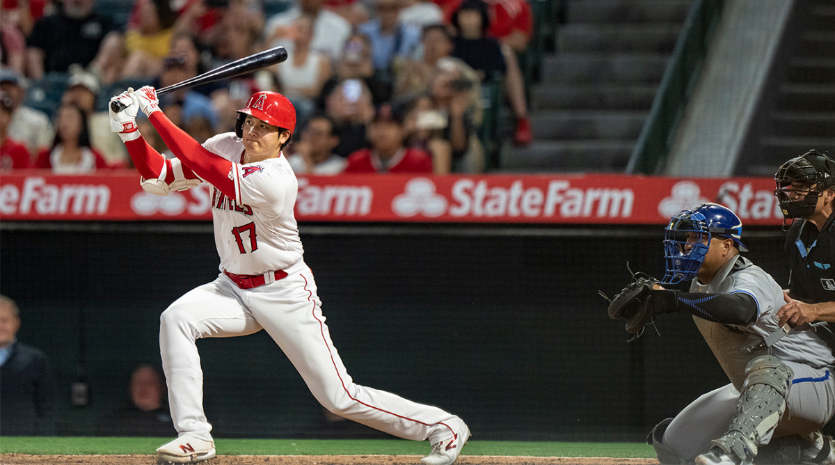 Shohei Ohtani gets a base hit against the Royals.