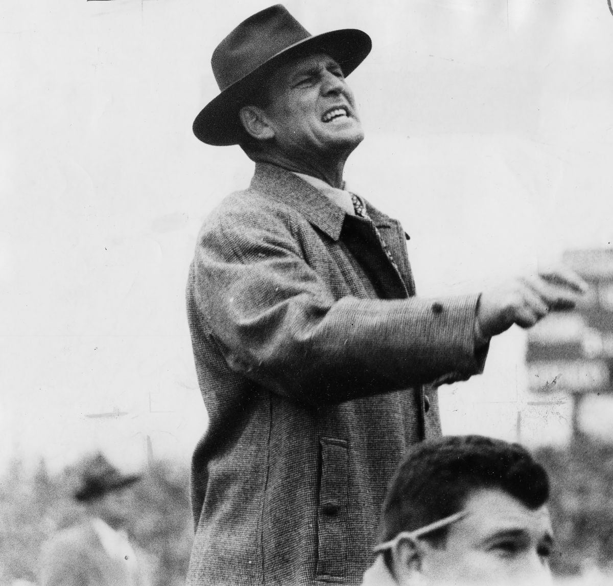 Paul W. "Bear" Bryant as the head coach at Kentucky