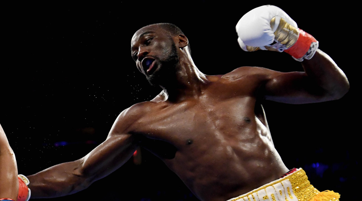 Boxer Terence Crawford delivers a right-handed body blow
