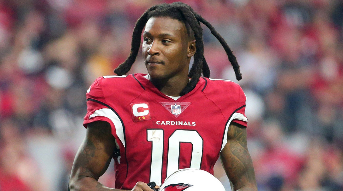 Former Cardinals receiver DeAndre Hopkins signed with the Titans.
