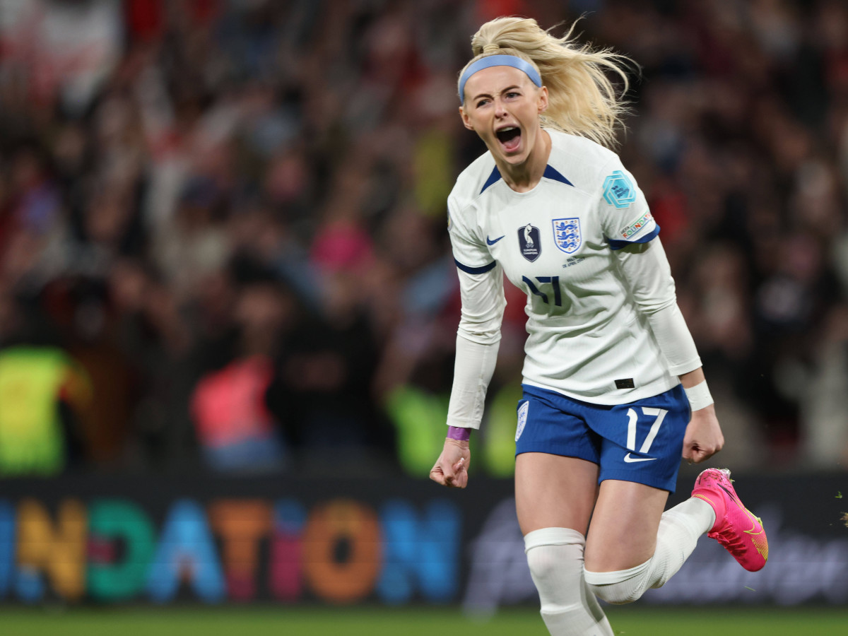 England forward Chloe Kelly celebrates scoring the winning penalty kick against Brazil.