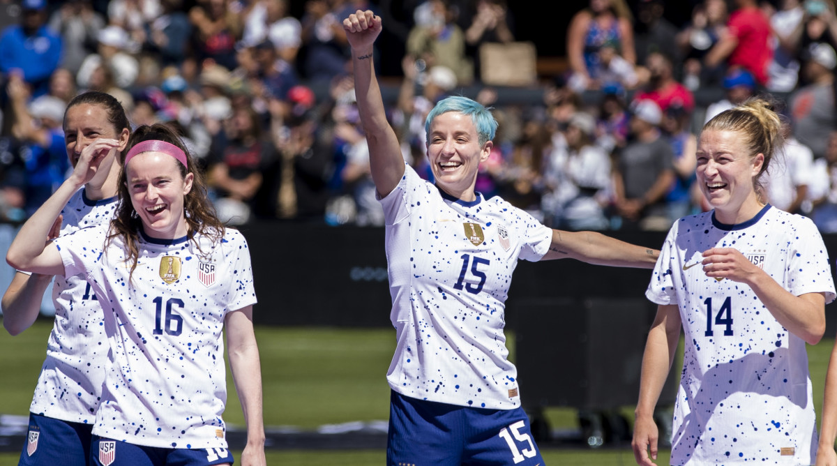 USWNT forward Megan Rapinoe celebrates with her teammates during Women's World Cup.