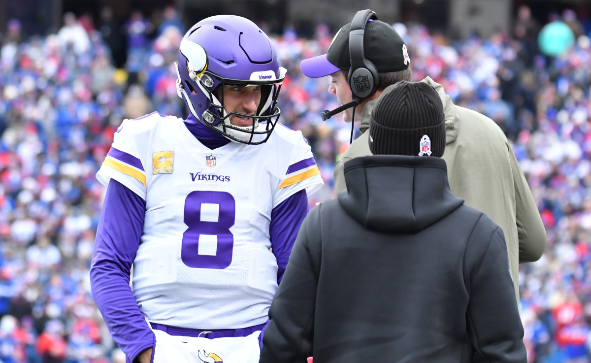 Nov 13, 2022; Orchard Park, New York, USA; Minnesota Vikings quarterback Kirk Cousins (8) gets instrucyion from head coach Kevin O'Connell in the first quarter game against the Buffalo Bills at Highmark Stadium.