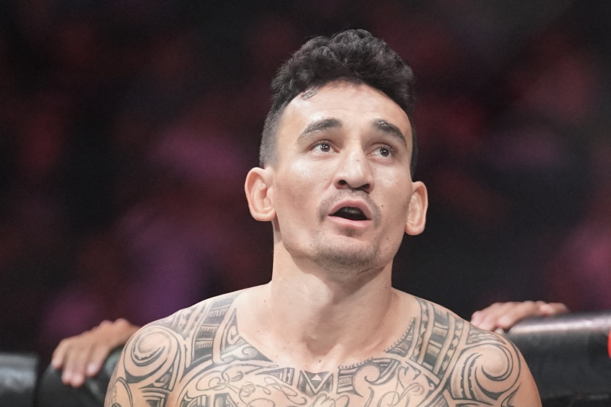 UFC featherweight legend Max Holloway enters the Octagon for a bout against Arnold Allen.