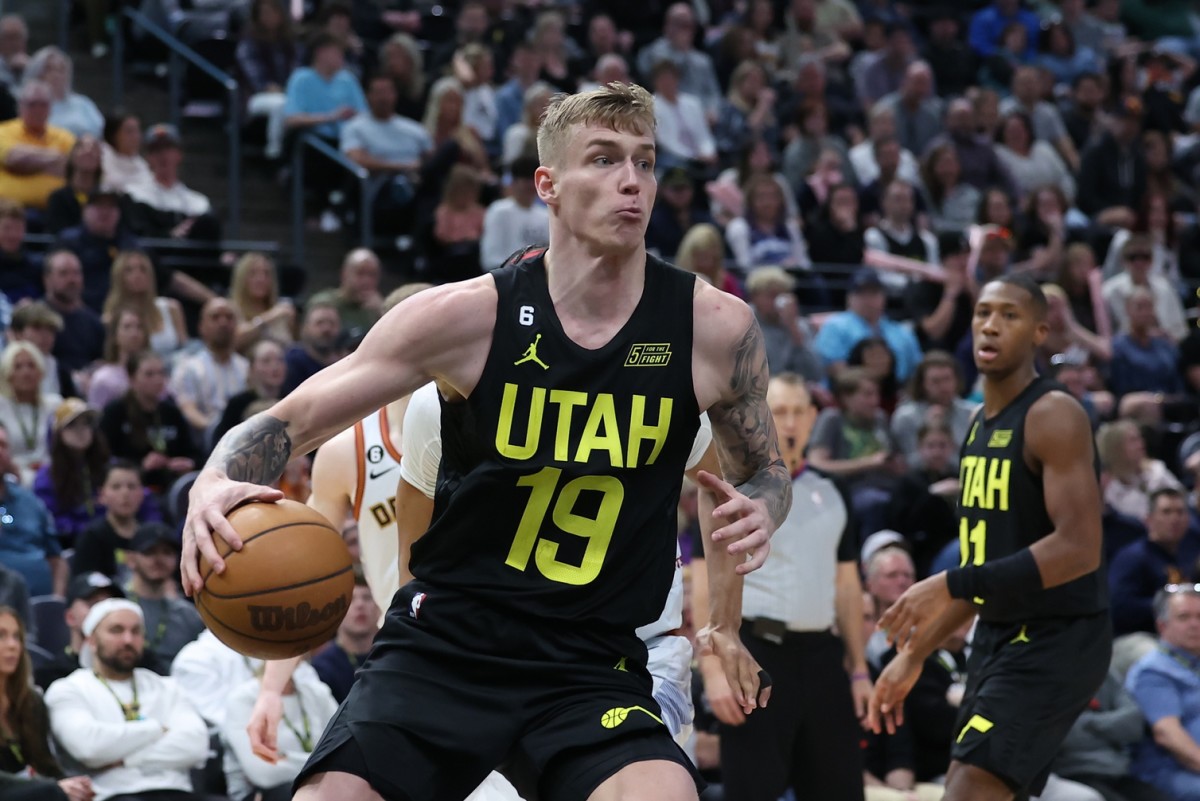 Utah Jazz forward Luka Samanic (19) goes to the basket against the Denver Nuggets in the fourth quarter at Vivint Arena.