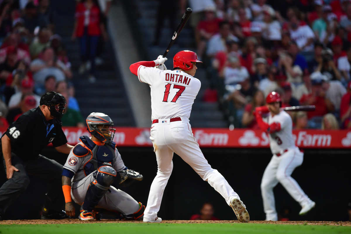 Los Angeles Angels starting pitcher Shohei Ohtani hits against the Houston Astros during the fifth inning at Angel Stadium. (2023)