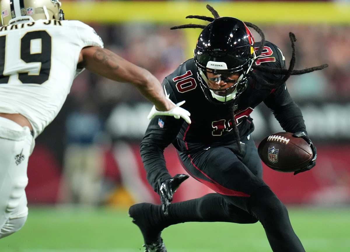 DeAndre Hopkins works with the ball against former New Orleans Saints cornerback Chris Harris Jr.