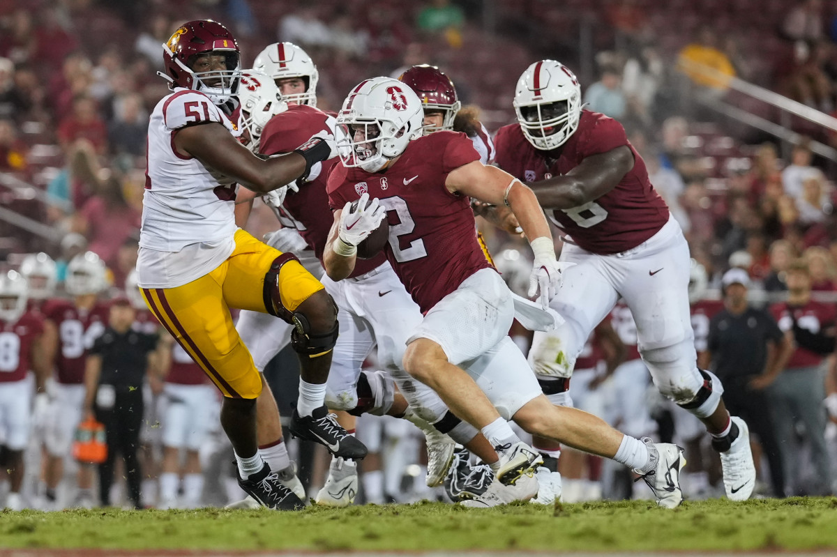 Sep 10, 2022; Stanford, California, USA; Stanford Cardinal running back Casey Filkins (2) runs with the football against the USC Trojans during the fourth quarter at Stanford Stadium. Mandatory Credit: Stan Szeto-USA TODAY Sports