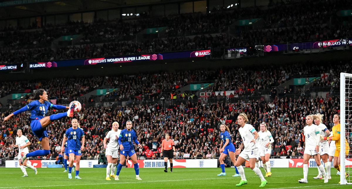 USWNT's Alana Cook controls the ball high during a friendly vs. England at Wembley Stadium.