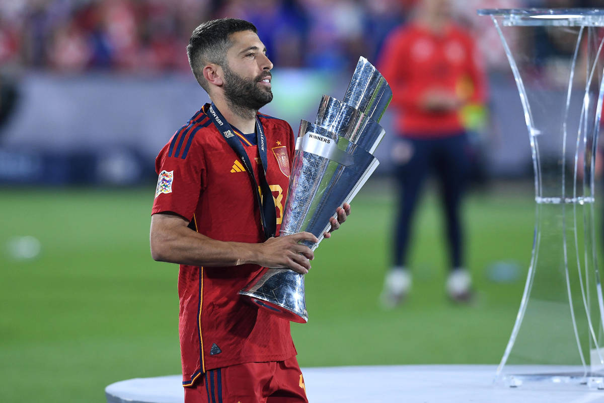 Jordi Alba pictured holding the UEFA Nations League trophy in June 2023 after captaining Spain to victory in the final against Croatia