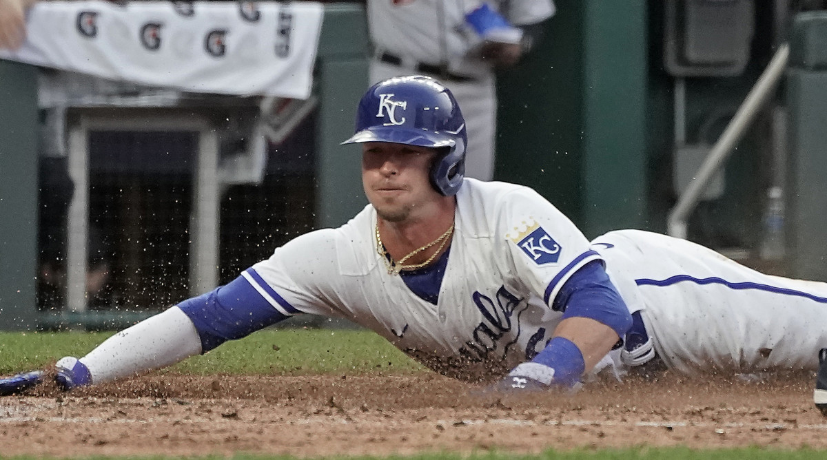 Royals outfielder Drew Waters slides home to score