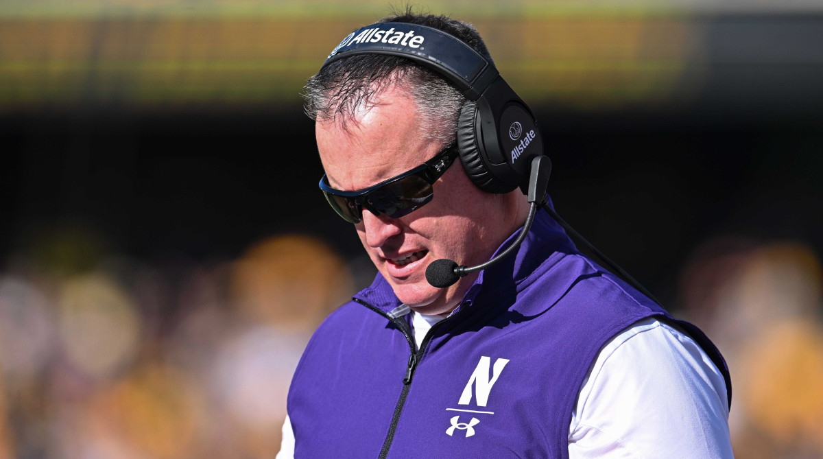 Former Northwestern coach Pat Fitzgerald on the sideline during a game.