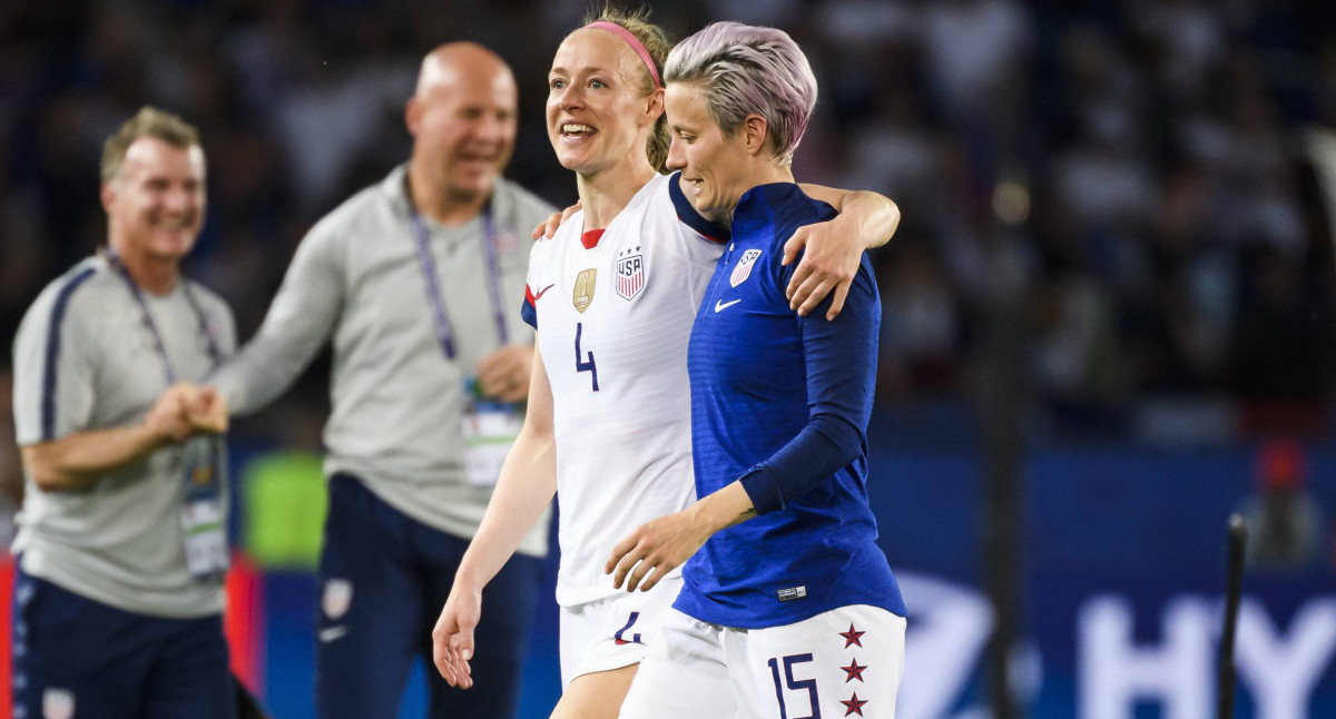 USWNT players Becky Sauerbrunn and Megan Rapinoe embrace after winning the 2019 Women's World Cup.