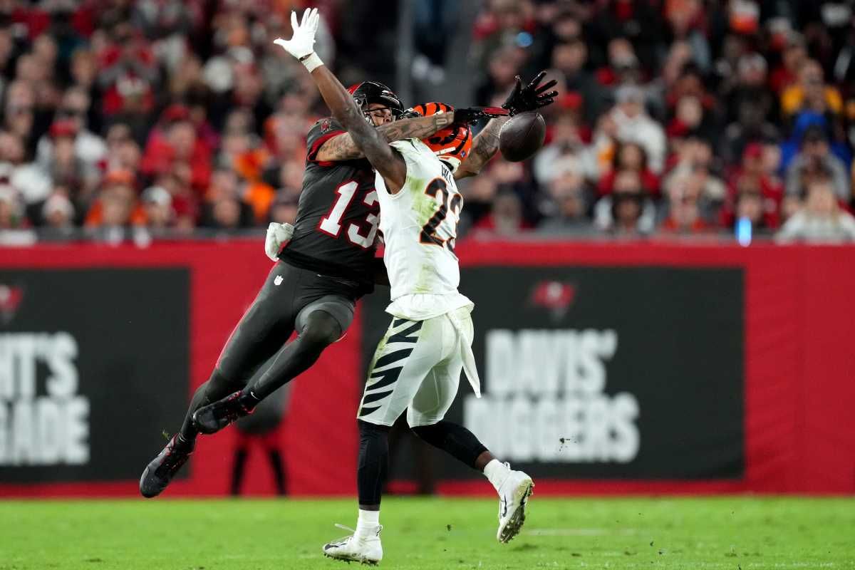 Bengals' S Daxton Hill defending a pass against Mike Evans