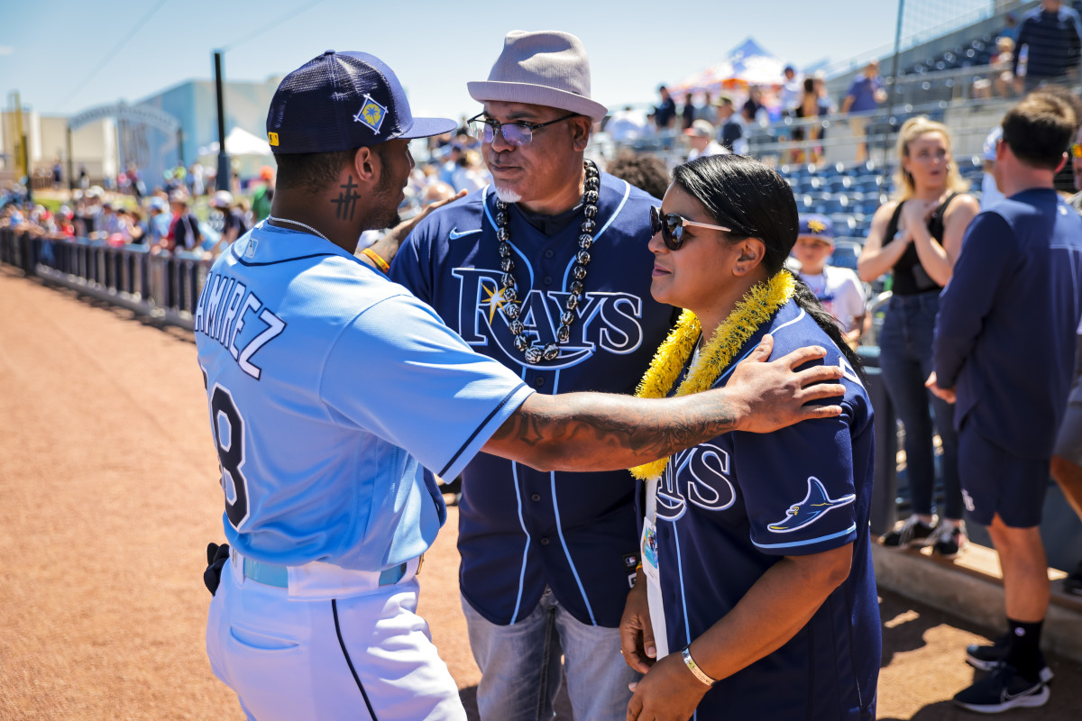 Toni and Carlos have become close to several Rays players; here they greet Wander Franco.