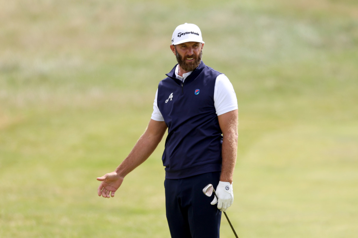 Dustin Johnson of the United States reacts after playing their shot on the 14th hole on Day Two of The 151st Open at Royal Liverpool Golf Club on July 21, 2023 in Hoylake, England.