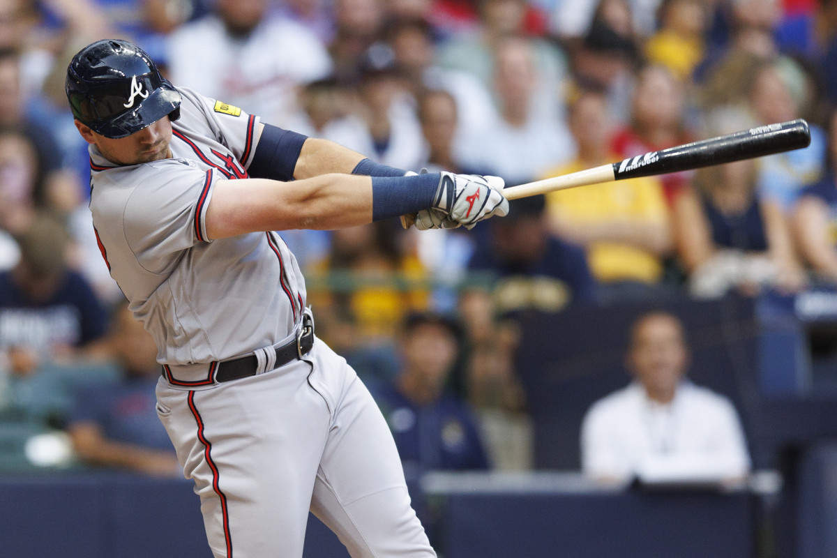 Jul 21, 2023; Milwaukee, Wisconsin, USA; Atlanta Braves third baseman Austin Riley (27) hits a home run during the third inning against the Milwaukee Brewers at American Family Field.