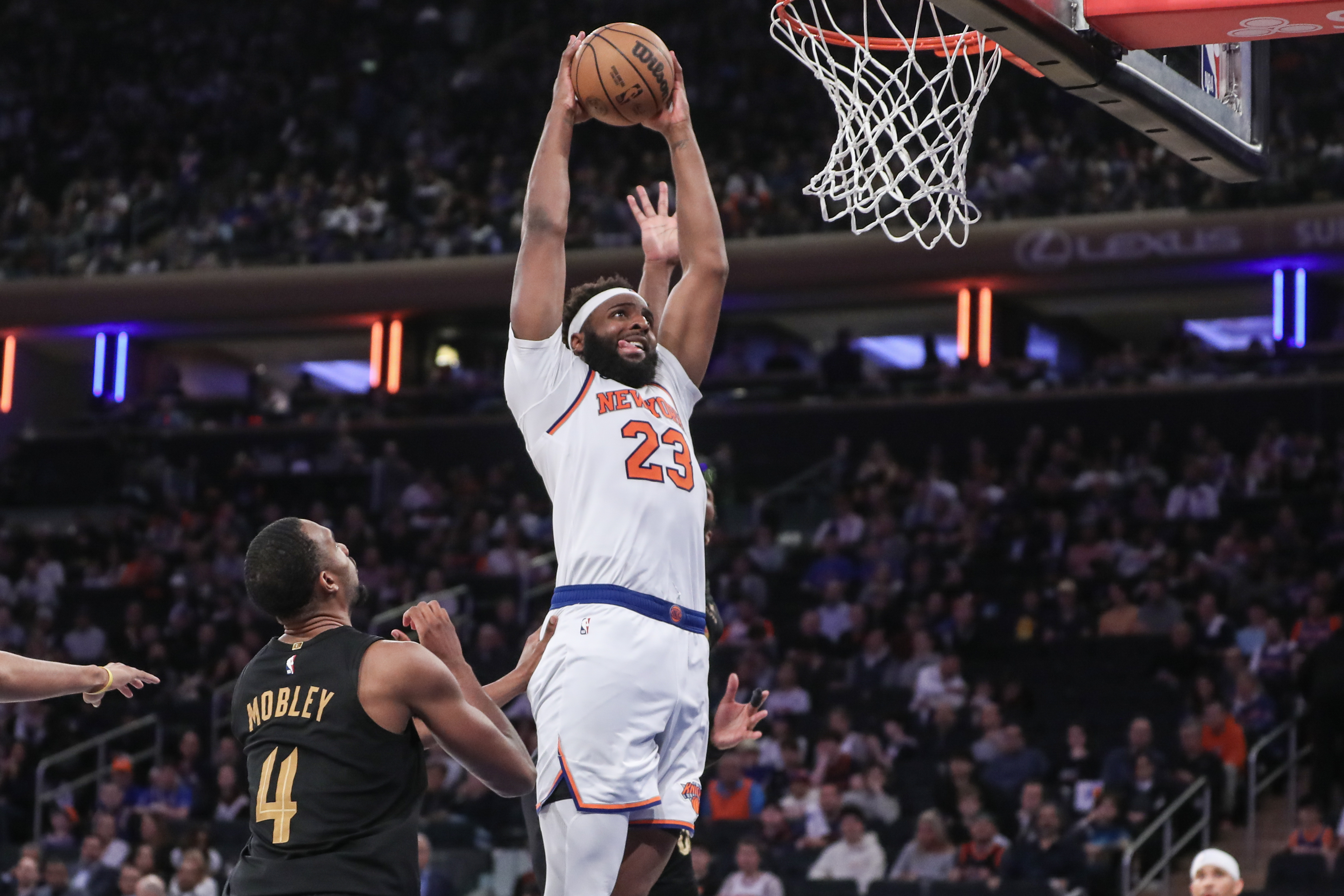 Apr 23, 2023; New York, New York, USA; New York Knicks center Mitchell Robinson (23) dunks during game four of the 2023 NBA playoffs against the Cleveland Cavaliers at Madison Square Garden. Mandatory Credit: Wendell Cruz-USA TODAY Sports