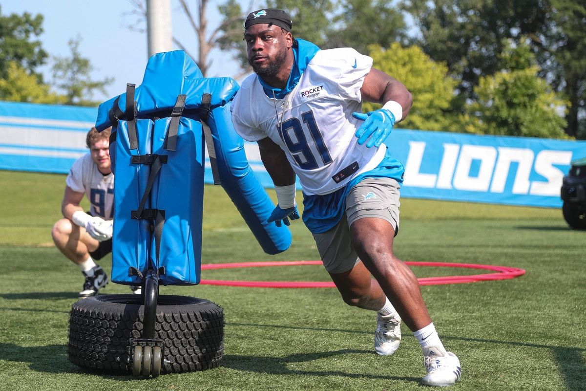 Ex-Husky Levi Onwuzurike took part in Detroit's first football camp practice.