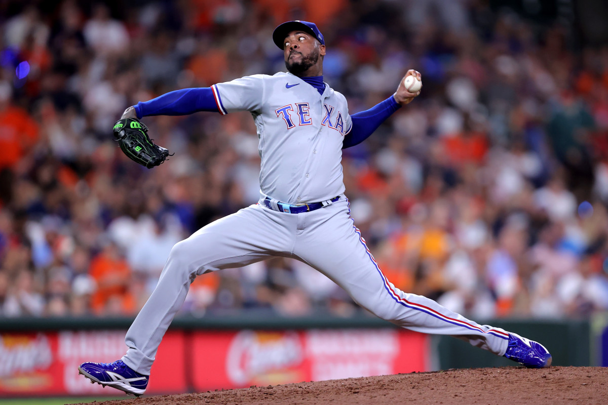 Jul 24, 2023; Houston, Texas, USA; Texas Rangers relief pitcher Aroldis Chapman (45) delivers a pitch against the Houston Astros during the seventh inning at Minute Maid Park. Mandatory Credit: Erik Williams-USA TODAY Sports