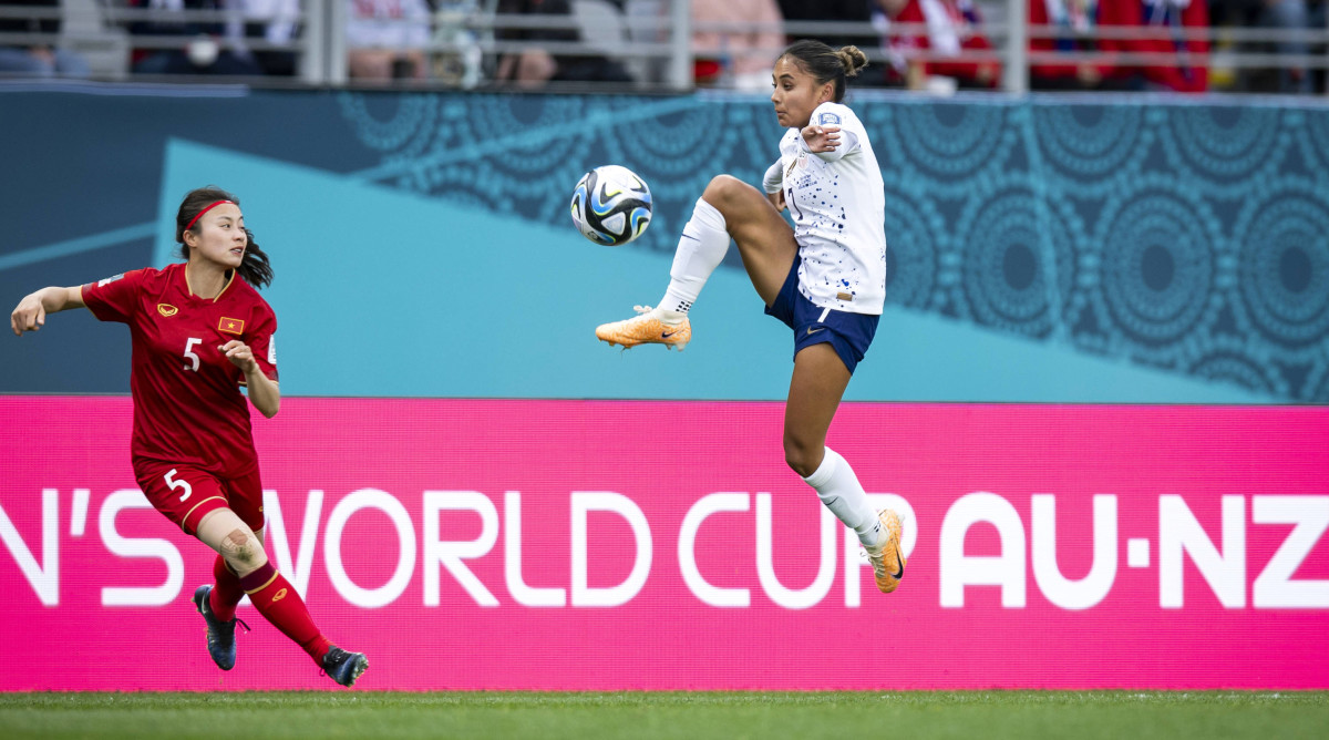 United States forward Alyssa Thompson jumps up to keep control of the ball against Vietnam at the Women’s World Cup.