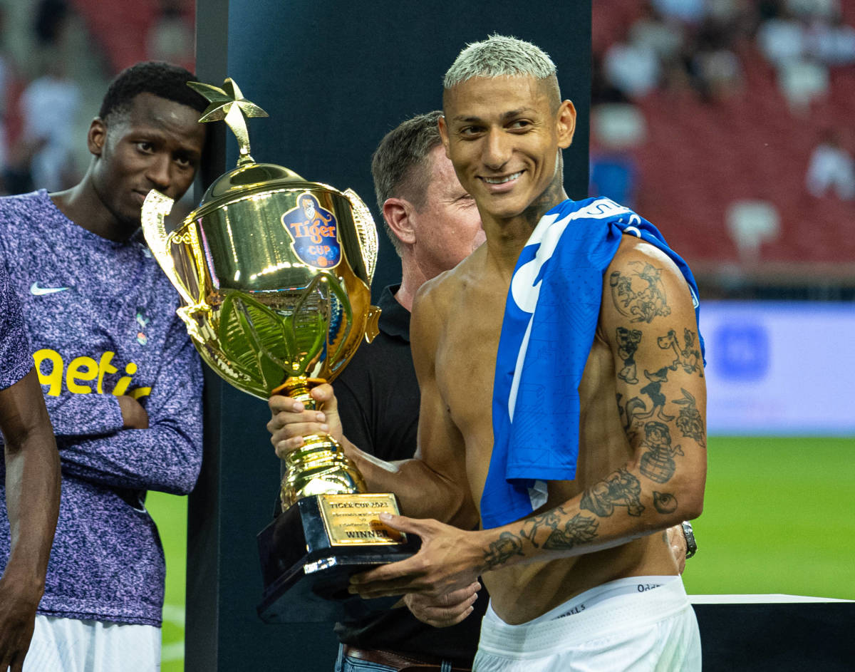 Richarlison pictured holding the Tiger Cup after scoring three goals in Tottenham's 5-1 win over Lion City Sailors in Singapore in July 2023