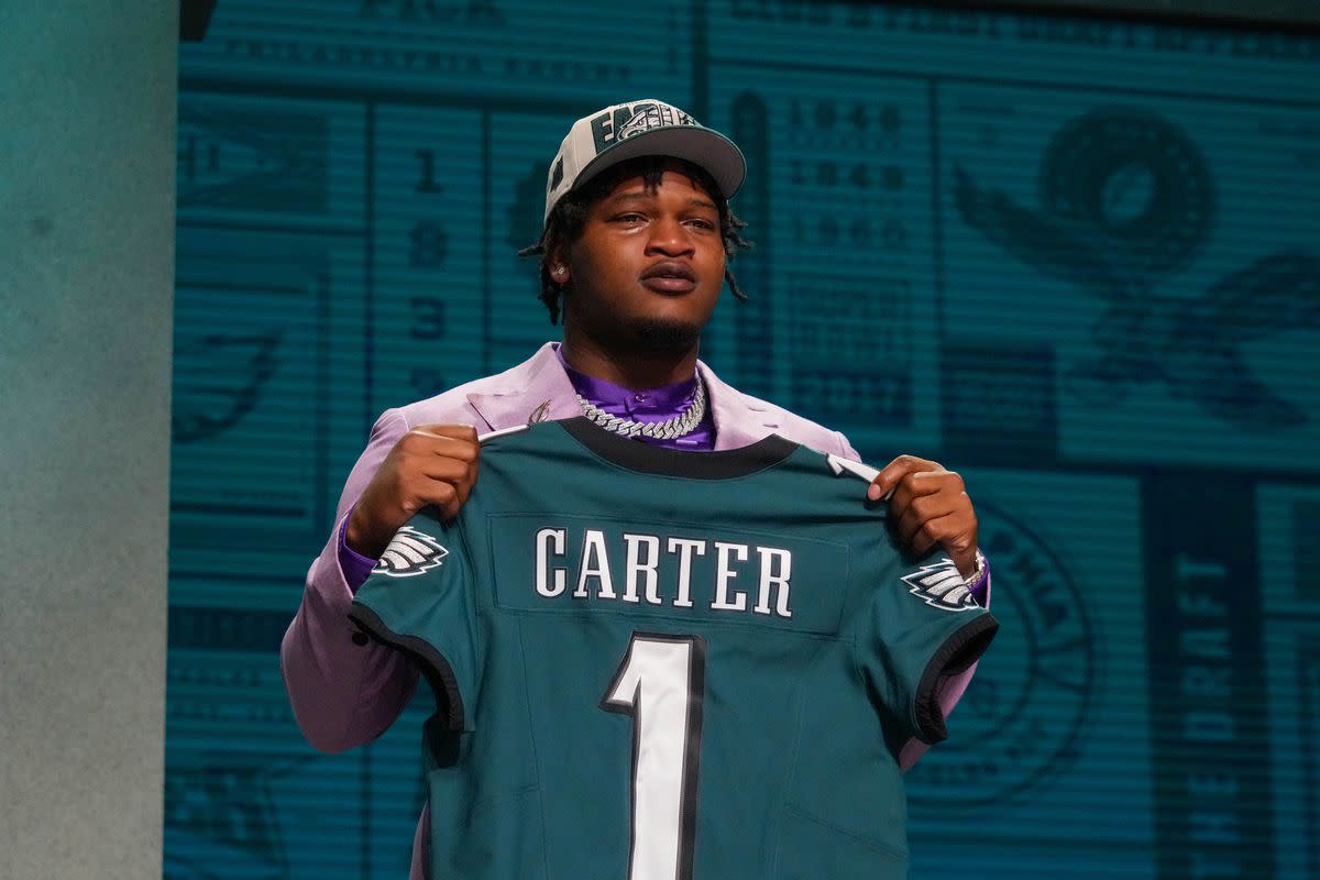 Jalen Carter poses for photos at the NFL Draft in Kansas City, MO on April 27 after being selected by the Philadelphia Eagles with the No. 9 overall pick. Carter is already impressing early in Eagles training camp.