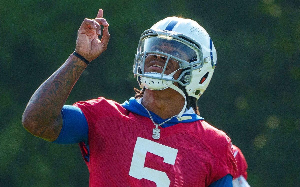 Jul 26, 2023; Westfield, IN, USA; Indianapolis Colts quarterback Anthony Richardson (5) points to the sky before drills during the first day of training camp practice at Grand Park Sports Campus. Mandatory Credit: Mykal McEldowney/IndyStar-USA TODAY Sports