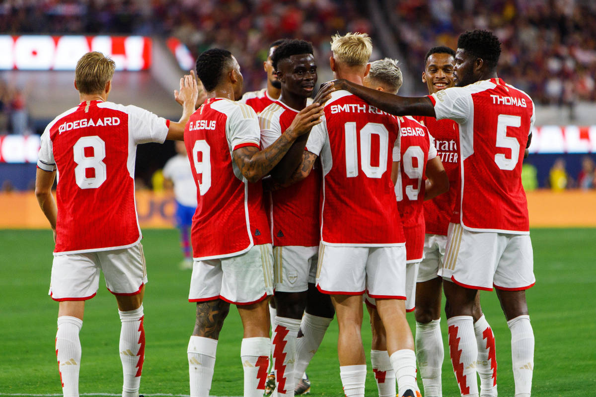 Arsenal's players pictured celebrating a goal during a 5-3 pre-season win over Barcelona in July 2023
