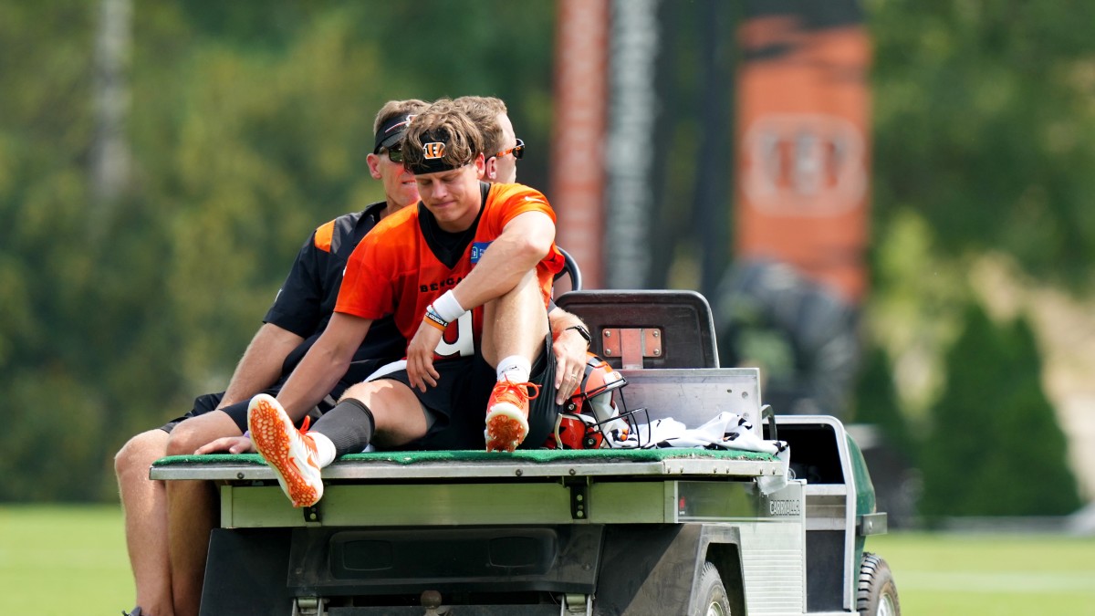 Joe Burrow taken off in a cart after a training camp injury.