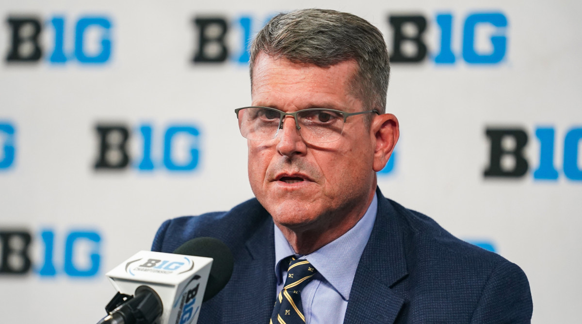 Michigan Wolverines head coach Jim Harbaugh speaks to the media during the Big 10 football media day