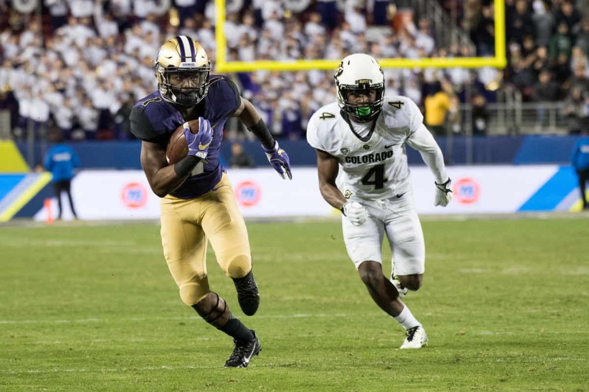 John Ross breaks free for the Huskies against Colorado in the 2016 Pac-12 championship game.