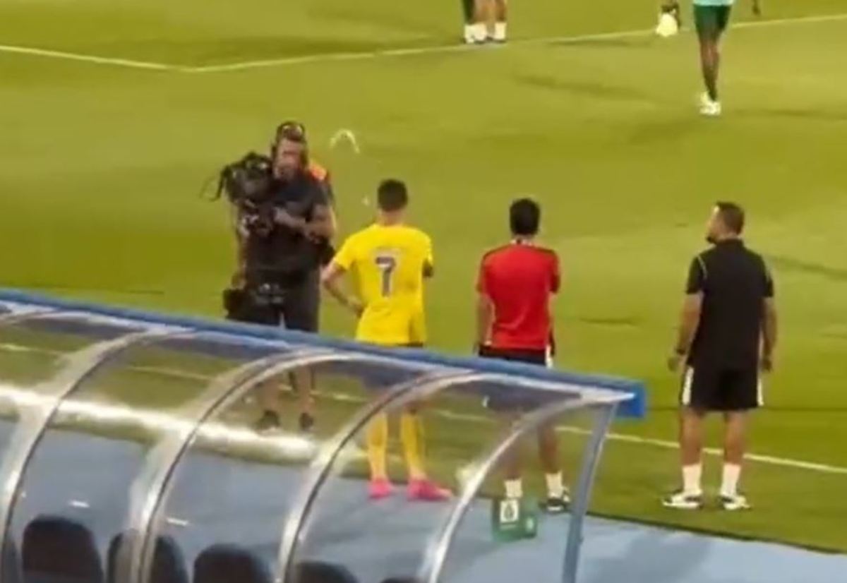 Al Nassr captain Cristiano Ronaldo pictured squirting water towards a cameraman following his team's 0-0 draw with Al-Shabab in July 2023