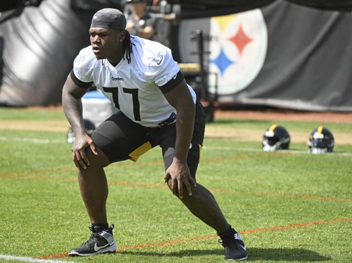 Former Georgia standout Broderick Jones goes through drills during training camp. The rookie is already receiving first team reps at left tackle.