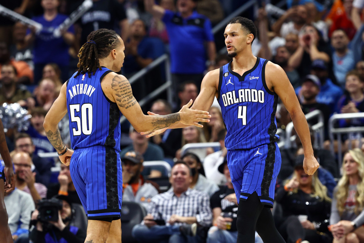Jan 20, 2023; Orlando, Florida, USA; Orlando Magic guard Jalen Suggs (4) is congratulated by guard Cole Anthony (50) against the New Orleans Pelicans during the second half at Amway Center. Mandatory Credit: Kim Klement-USA TODAY Sports