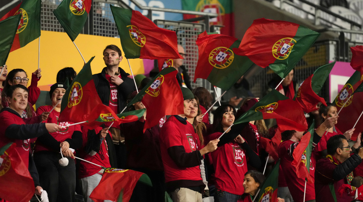 Portugal supporters cheer while Portugal plays the Netherlands at the Women's World Cup.