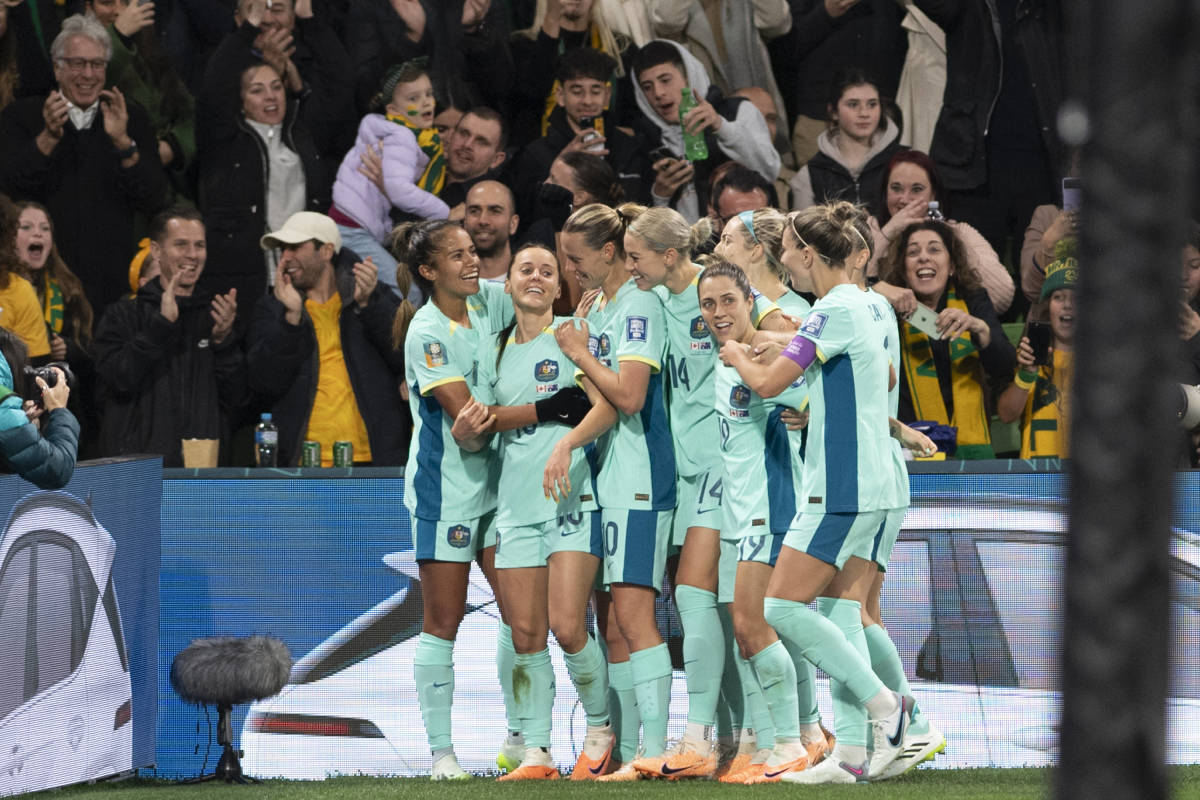 Australia's players pictured celebrating a goal during a 4-0 win over Canada at the 2023 FIFA Women's World Cup