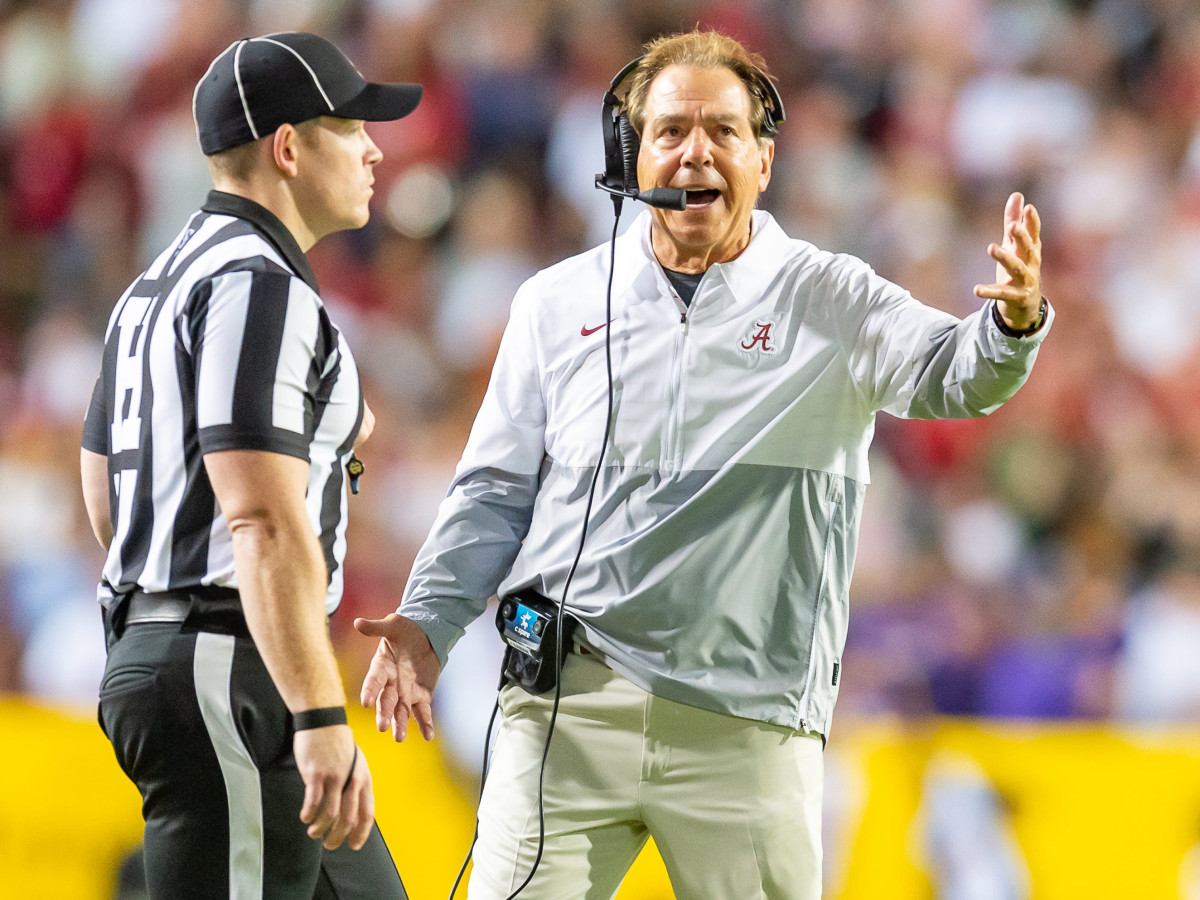 Alabama head coach Nick Saban talks to a ref as the Crimson Tide play LSU.